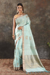 Shop stunning mint green muga silk saree online in USA with zari border. Be vision of elegance on special occasions in exquisite designer sarees, handwoven sarees, georgette sarees, embroidered sarees, Banarasi sarees from Pure Elegance Indian saree store in USA.-full view