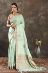 Shop elegant pastel green muga silk sari online in USA with zari border. Be vision of elegance on special occasions in exquisite designer sarees, handwoven sarees, georgette sarees, embroidered sarees, Banarasi sarees from Pure Elegance Indian saree store in USA.-full view