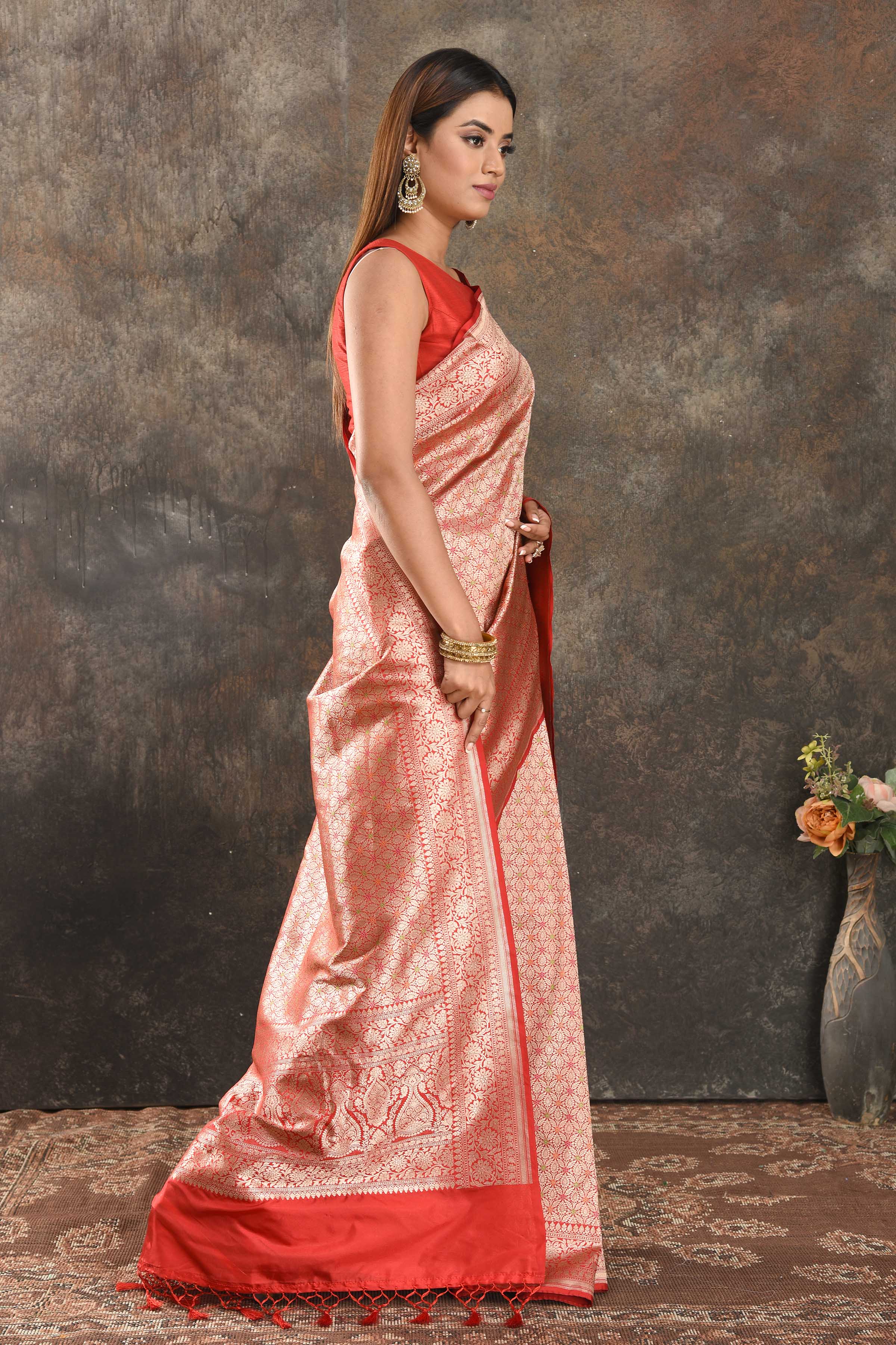 Shop beautiful red silk saree online in USA with heavy zari work. Be vision of elegance on special occasions in exquisite designer sarees, handwoven sarees, georgette sarees, embroidered sarees, Banarasi saree, pure silk saris from Pure Elegance Indian saree store in USA.-side