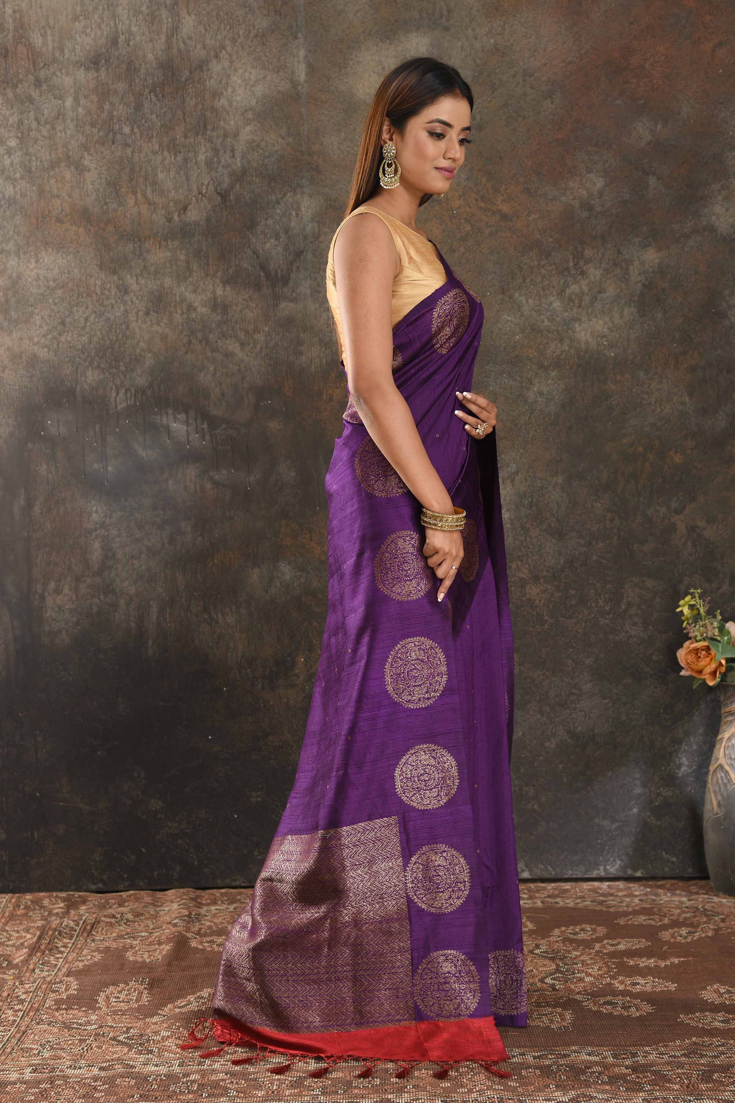 Shop purple tussar Banarasi sari online in USA with antique zari buta. Be vision of elegance on special occasions in exquisite designer sarees, handwoven sarees, georgette sarees, embroidered sarees, Banarasi saree, pure silk saris from Pure Elegance Indian saree store in USA.-side