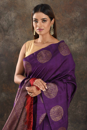 Shop purple tussar Banarasi sari online in USA with antique zari buta. Be vision of elegance on special occasions in exquisite designer sarees, handwoven sarees, georgette sarees, embroidered sarees, Banarasi saree, pure silk saris from Pure Elegance Indian saree store in USA.-closeup