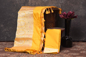 Shop yellow Katan silk Banarasi sari online in USA with zari work. Be vision of elegance on special occasions in exquisite designer sarees, handwoven sarees, georgette sarees, embroidered sarees, Banarasi saree, pure silk saris, tussar sarees from Pure Elegance Indian saree store in USA.-blouse