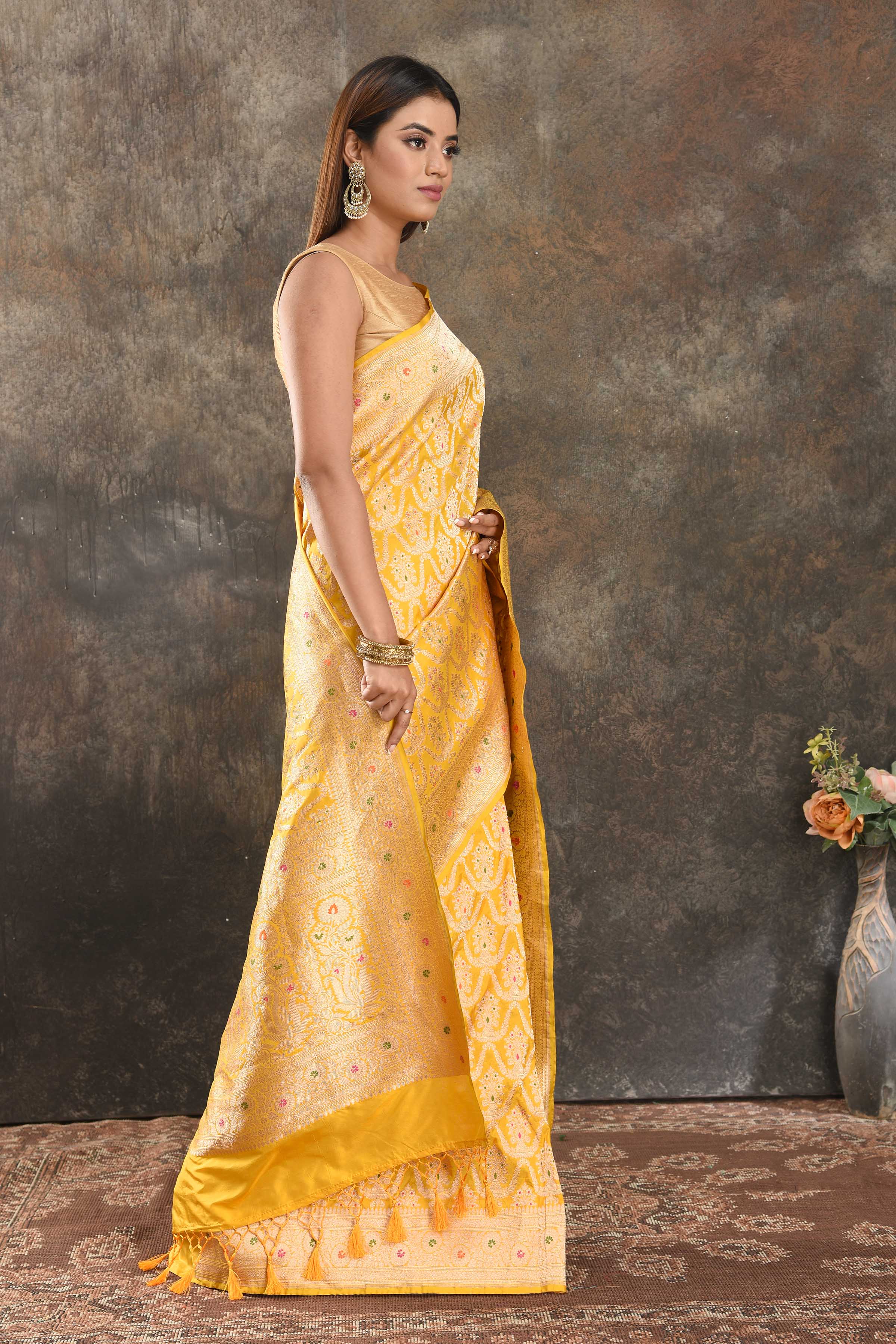 Shop yellow Katan silk Banarasi sari online in USA with zari work. Be vision of elegance on special occasions in exquisite designer sarees, handwoven sarees, georgette sarees, embroidered sarees, Banarasi saree, pure silk saris, tussar sarees from Pure Elegance Indian saree store in USA.-side