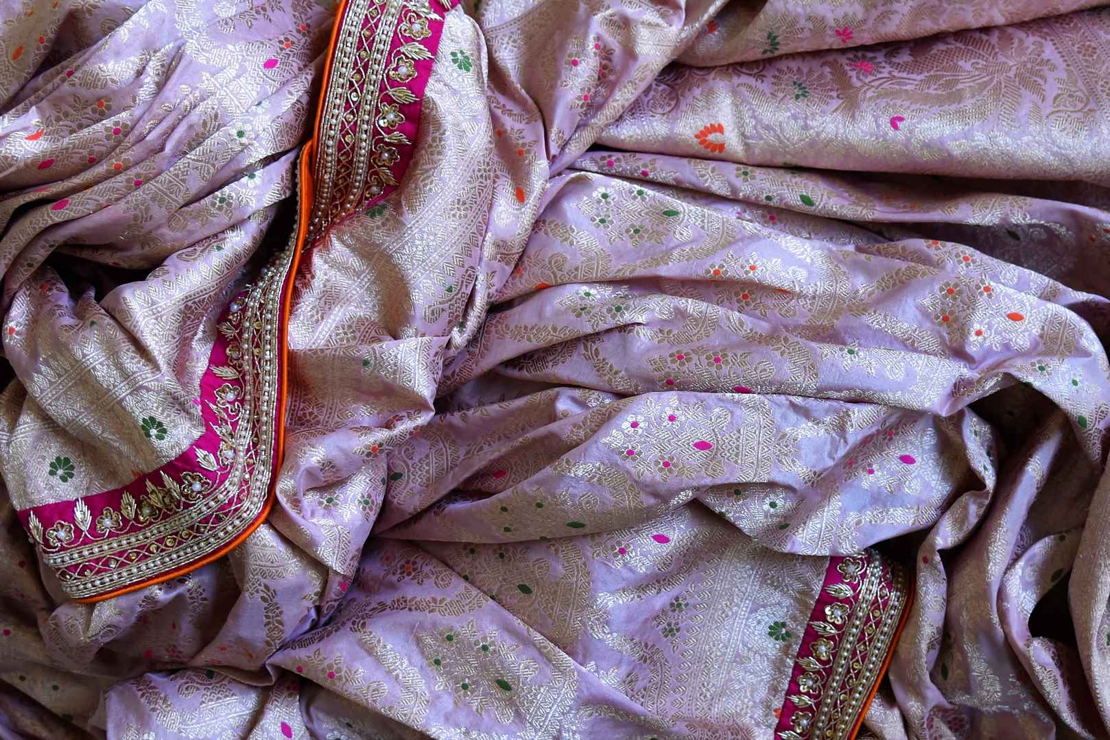 Shop lilac designer Banarasi saree online in USA with pink embroidered blouse. Look elegant on special occasions in beautiful printed sarees, silk sarees, tussar sarees, handloom sarees, Kanchipuram sarees from Pure Elegance Indian saree store in USA.-details