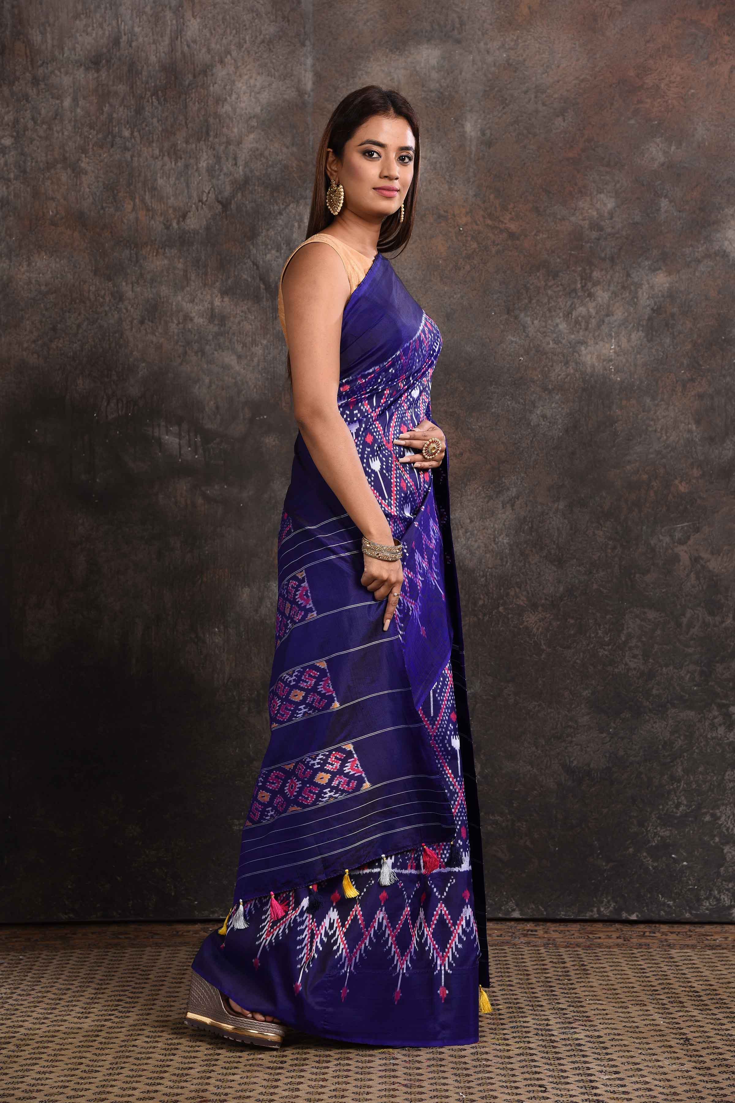 Shop stunning navy blue ikkat silk saree online in USA with zari stripes pallu. Look your ethnic best on festive occasions with latest designer sarees, pure silk sarees, Kanchipuram silk sarees, handwoven sarees, tussar silk sarees, embroidered sarees from Pure Elegance Indian saree store in USA.-side