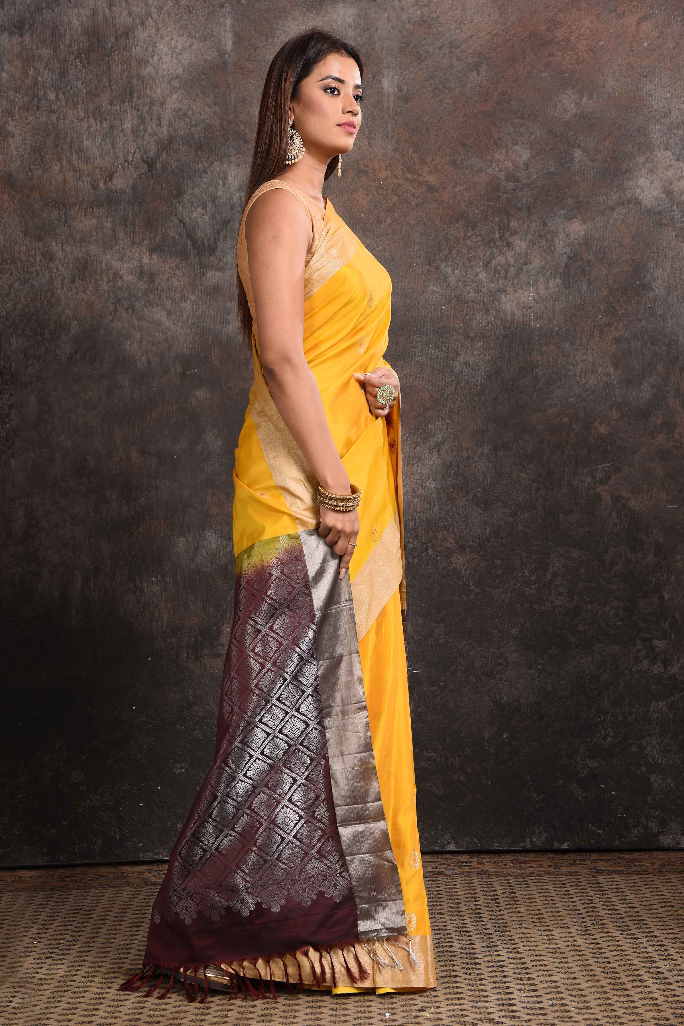 Shop stunning yellow Kanjeevaram silk sari online in USA with black zari pallu. Keep your ethnic wardrobe up to date with latest designer sarees, pure silk sarees, Kanchipuram silk sarees, handwoven sarees, tussar silk sarees, embroidered sarees from Pure Elegance Indian saree store in USA.-side
