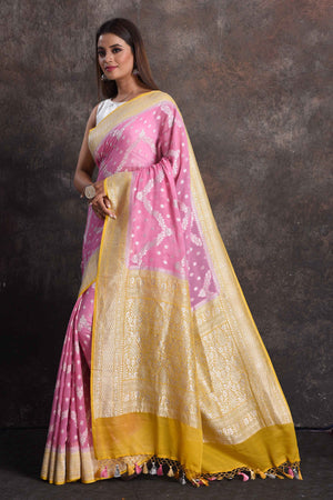 Buy beautiful pastel pink georgette Banarasi saree online in USA with mustard border, Be a vision of ethnic elegance on festive occasions in beautiful designer sarees, silk sarees, handloom sarees, Kanchipuram silk sarees, embroidered sarees from Pure Elegance Indian saree store in USA. -pallu