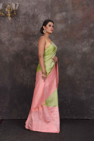 Shop beautiful pista green Kanchipuram silk saree online in USA with pink border. Look your best at parties in elegant silk sarees, designer sarees, handwoven sarees, Kanchipuram silk sarees, embroidered sarees, South silk sarees from Pure Elegance Indian saree store in USA.-side