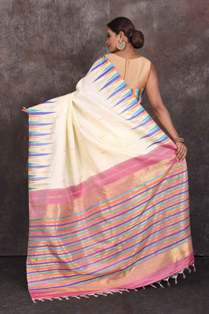 Buy elegant cream Kanjivaram silk saree online in USA with multicolor temple border. Look your best at parties in elegant silk sarees, designer sarees, handwoven sarees, Kanchipuram silk sarees, embroidered sarees, South silk sarees from Pure Elegance Indian saree store in USA.-back