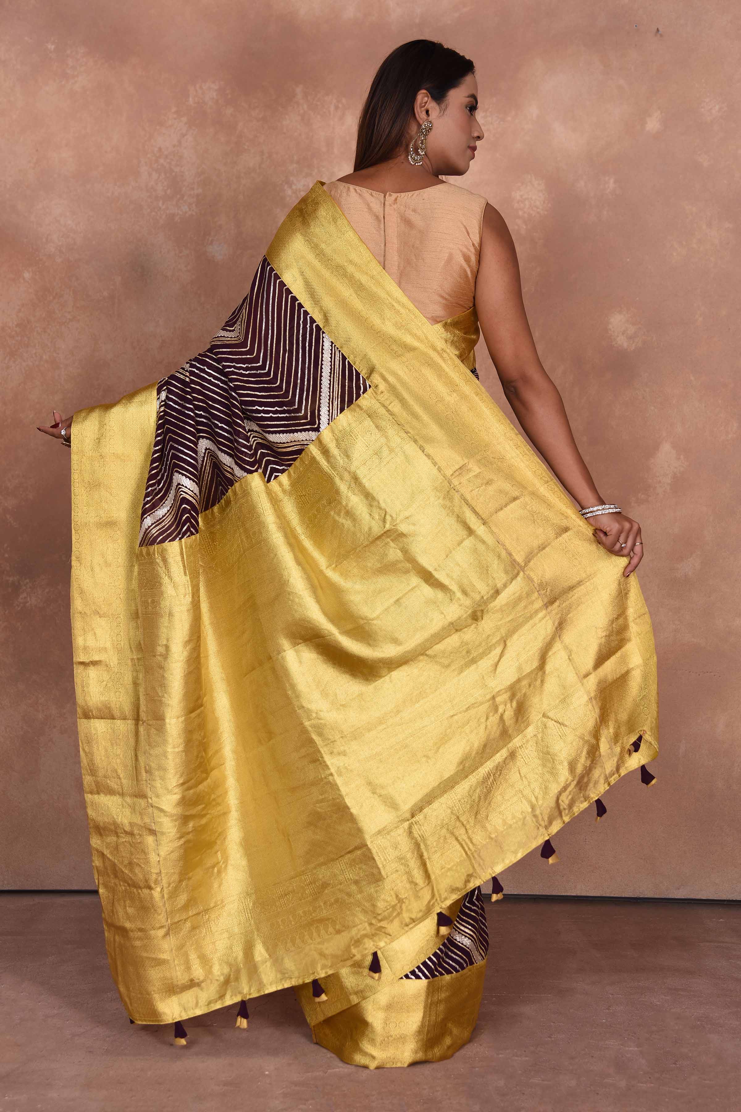 Shop brown Kanjeevaram georgette sari online in USA with gota work. Keep your ethnic wardrobe up to date with latest designer sarees, pure silk saris, Kanchipuram silk sarees, handwoven sarees, tussar silk saris, embroidered sarees, soft silk sarees, Kora silk sarees from Pure Elegance Indian saree store in USA.-back