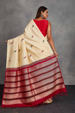 Shop beautiful cream Kanjivaram silk saree online in USA with parrot buta. Get festive ready in beautiful Kanchipuram silk saris, pure silk sarees, soft silk sarees, tussar silk saris, handwoven sarees, chanderi silk sarees from Pure Elegance Indian fashion store in USA.-back