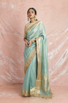 Buy gorgeous mint green embroidered handloom saree online in USA with cream embroidered saree blouse. Champion ethnic fashion on weddings and festivals with a stunning collection of designer sarees, handloom sarees with blouse, wedding sarees, from Pure Elegance Indian fashion store in USA.-full view