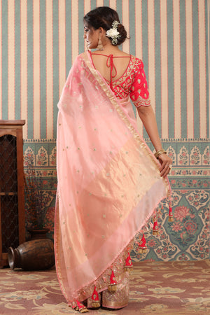 Shop powder pink organza silk sari online in USA with gota work border. Make a fashion statement at weddings with stunning designer sarees, embroidered sarees with blouse, wedding sarees, handloom sarees from Pure Elegance Indian fashion store in USA.-back