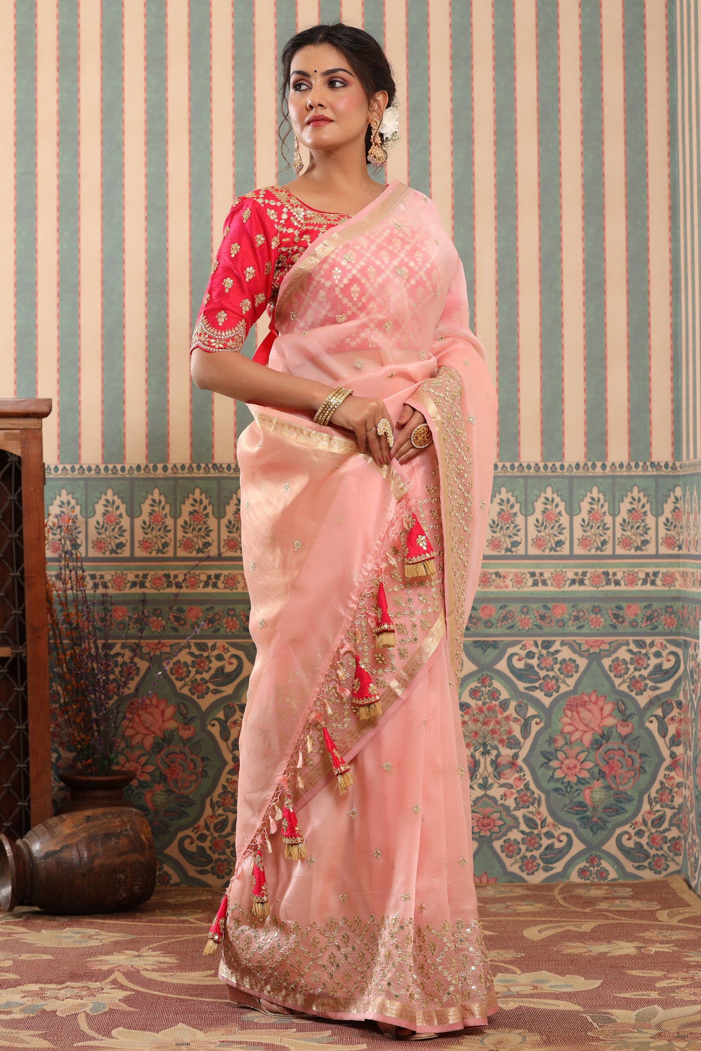Shop powder pink organza silk sari online in USA with gota work border. Make a fashion statement at weddings with stunning designer sarees, embroidered sarees with blouse, wedding sarees, handloom sarees from Pure Elegance Indian fashion store in USA.-side