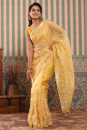 Shop pink and yellow organza sari online in USA with gota work. Make a fashion statement at weddings with stunning designer sarees, embroidered sarees with blouse, wedding sarees, handloom sarees from Pure Elegance Indian fashion store in USA.-front