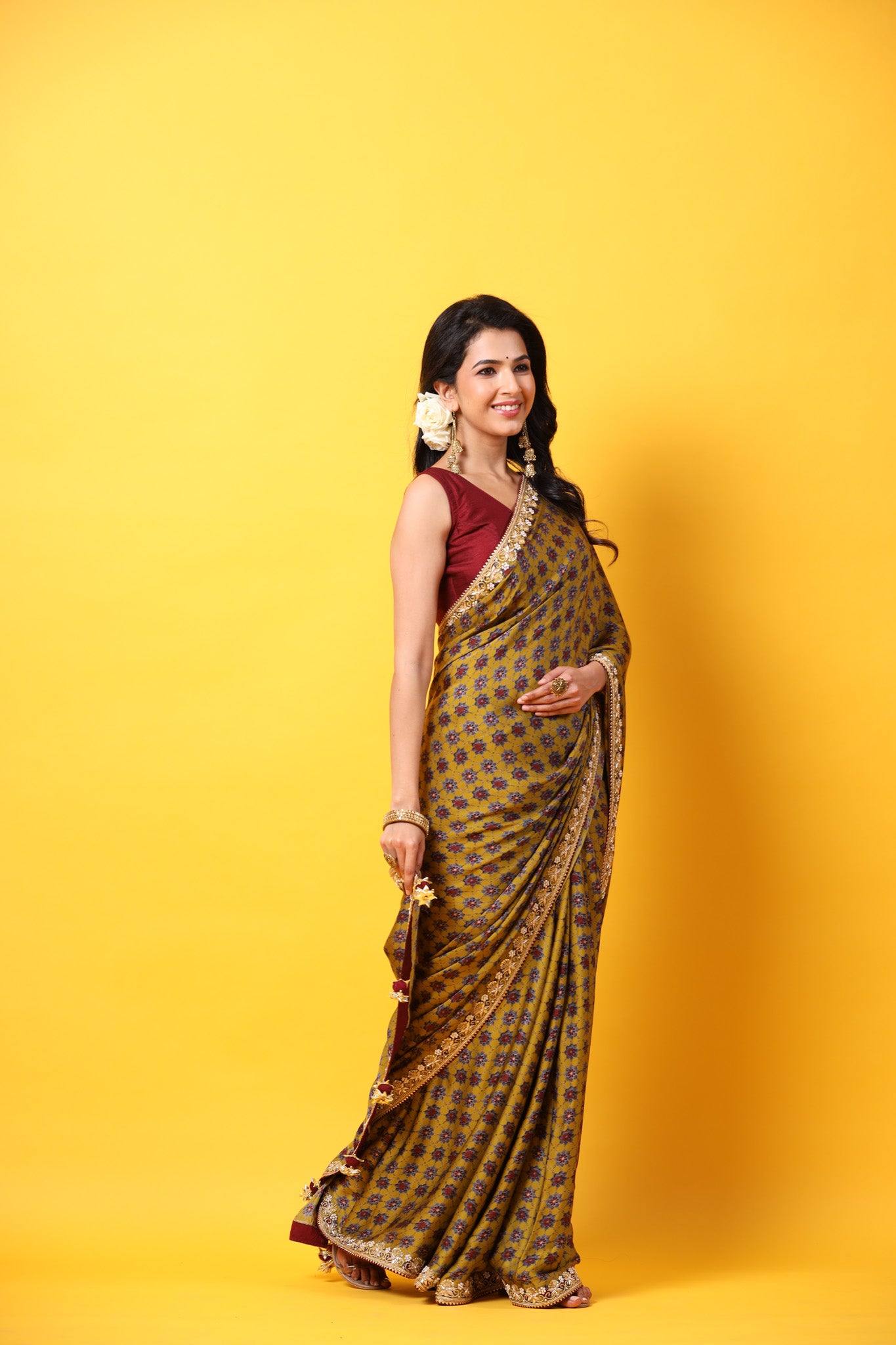 Buy mustard printed georgette sari online in USA with embroidered lace border. Make a fashion statement at weddings with stunning designer sarees, embroidered sarees with blouse, wedding sarees, handloom sarees from Pure Elegance Indian fashion store in USA.-side