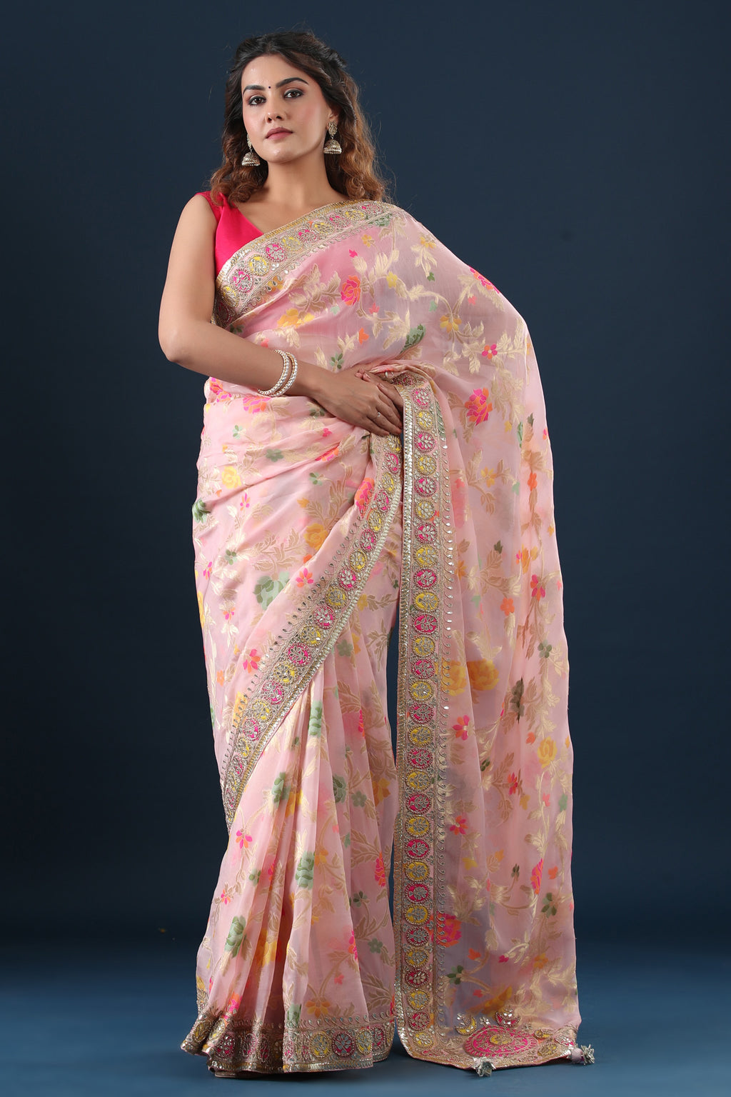 Buy light pink organza silk saree online in USA with embroidered border. Make a fashion statement at weddings with stunning designer sarees, embroidered sarees with blouse, wedding sarees, handloom sarees from Pure Elegance Indian fashion store in USA.-full view