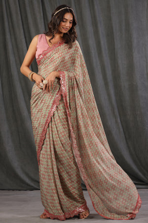 Shop pink green printed georgette saree online in USA with scalloped border. Make a fashion statement at weddings with stunning designer sarees, embroidered sarees with blouse, wedding sarees, handloom sarees from Pure Elegance Indian fashion store in USA.-pallu