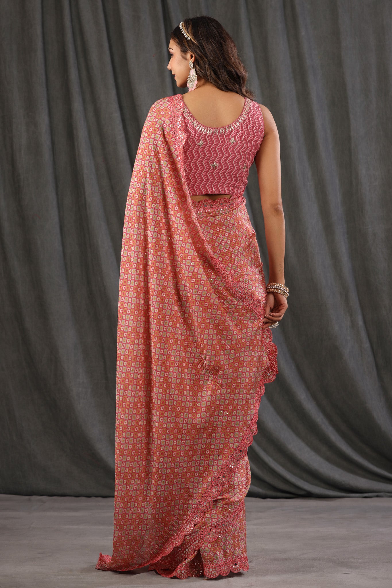 Buy pink printed crepe georgette saree online in USA with scalloped border. Make a fashion statement at weddings with stunning designer sarees, embroidered sarees with blouse, wedding sarees, handloom sarees from Pure Elegance Indian fashion store in USA.-back