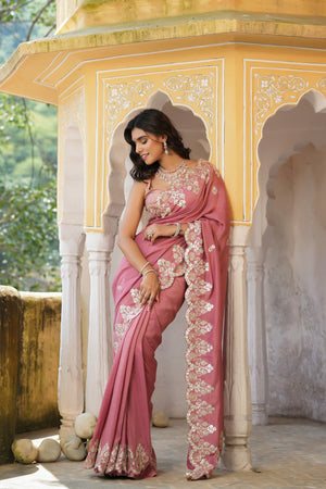 Shop beautiful dusty pink tussar georgette saree online in USA with embroidered border. Make a fashion statement at weddings with stunning designer sarees, embroidered sarees with blouse, wedding sarees, handloom sarees from Pure Elegance Indian fashion store in USA.-front
