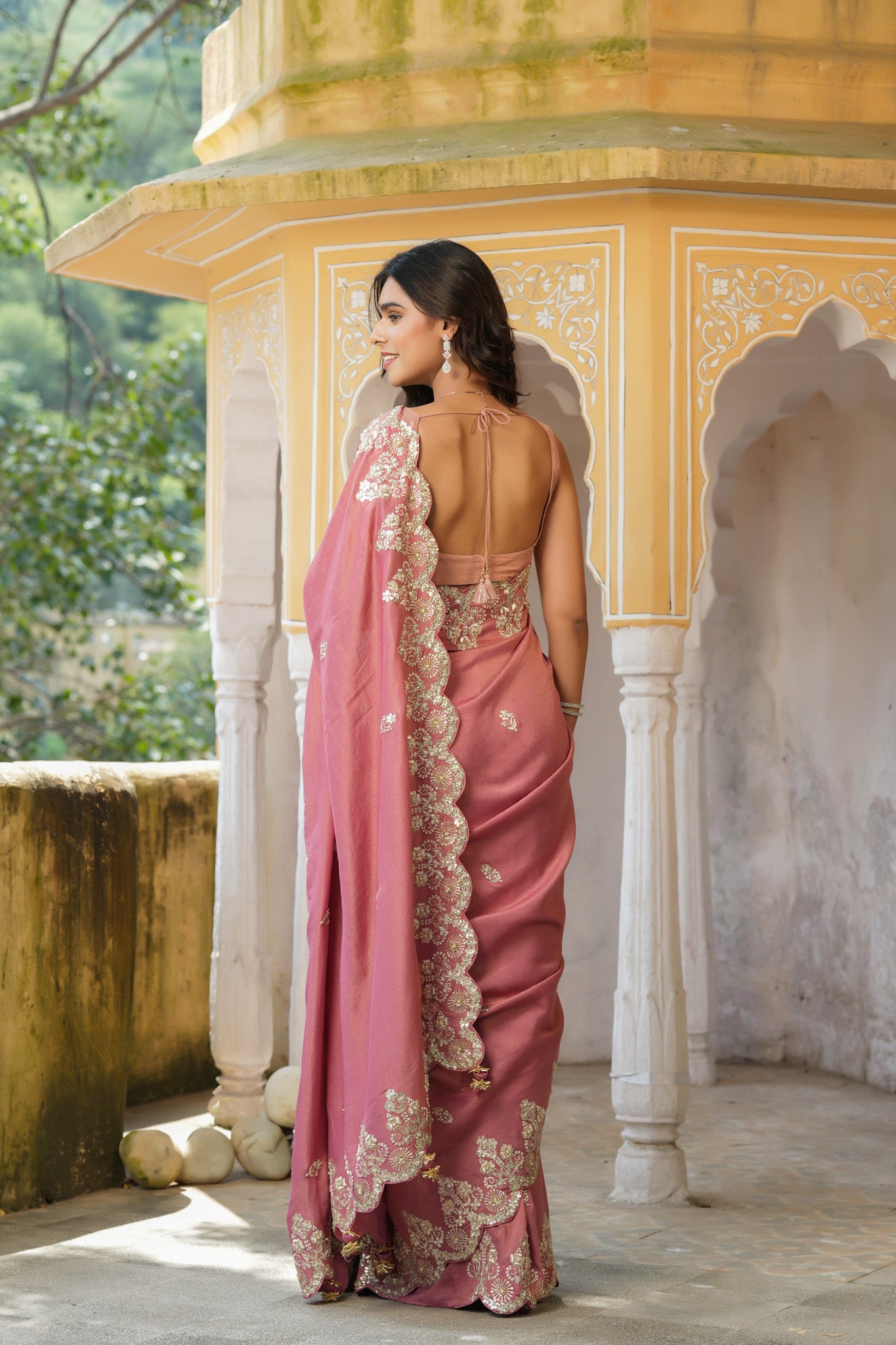 Shop beautiful dusty pink tussar georgette saree online in USA with embroidered border. Make a fashion statement at weddings with stunning designer sarees, embroidered sarees with blouse, wedding sarees, handloom sarees from Pure Elegance Indian fashion store in USA.-back