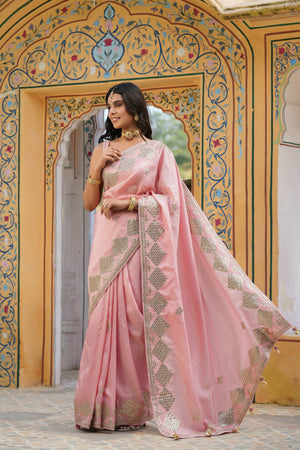Shop baby pink embroidered tussar georgette saree online in USA with blouse. Make a fashion statement at weddings with stunning designer sarees, embroidered sarees with blouse, wedding sarees, handloom sarees from Pure Elegance Indian fashion store in USA.-pallu