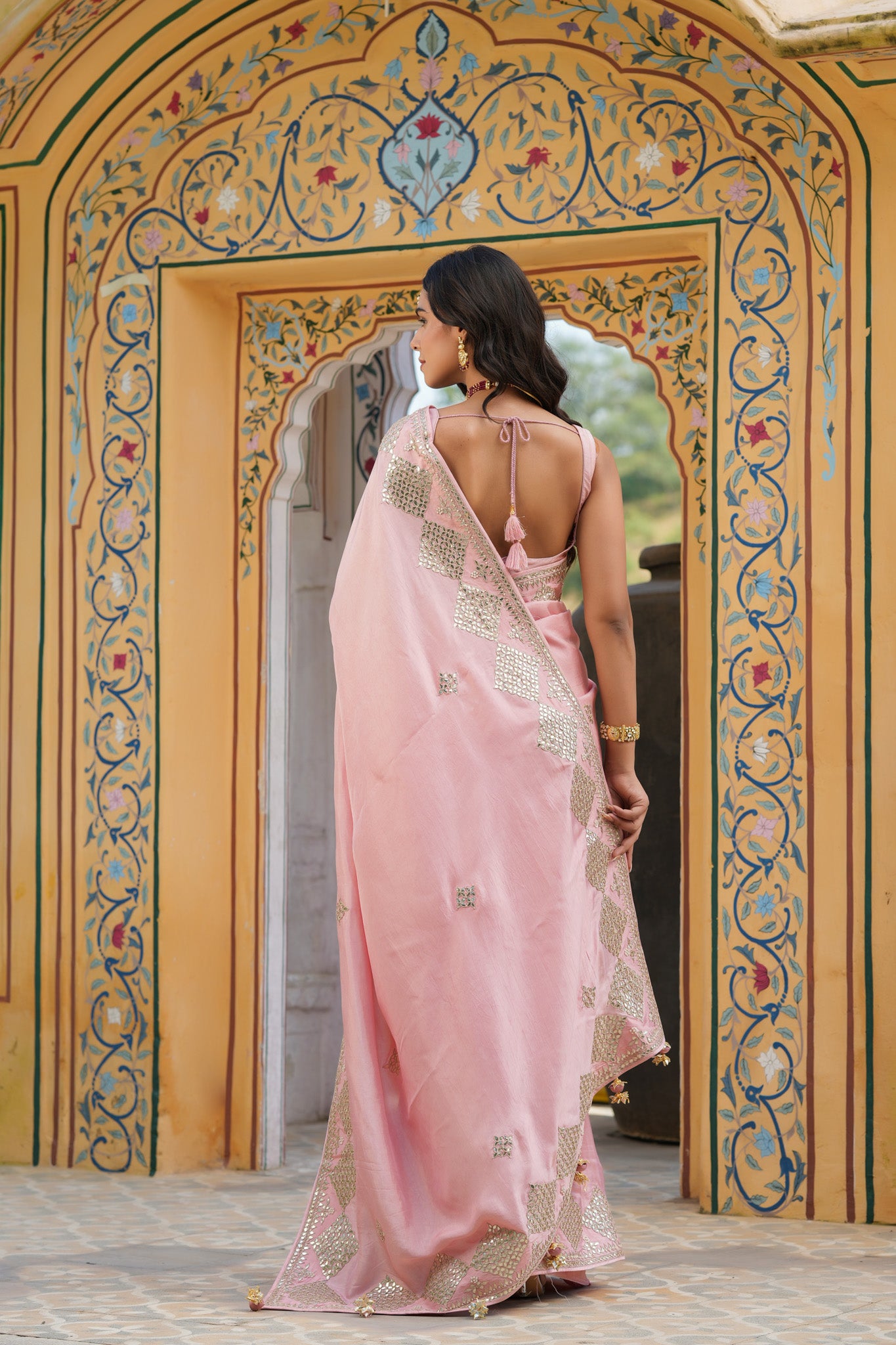 Shop baby pink embroidered tussar georgette saree online in USA with blouse. Make a fashion statement at weddings with stunning designer sarees, embroidered sarees with blouse, wedding sarees, handloom sarees from Pure Elegance Indian fashion store in USA.-back
