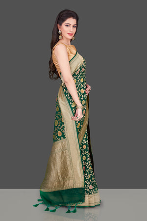 Buy dark green Benarasi georgette sari online in USA with floral zari jaal. Shop beautiful Banarasi georgette sarees, tussar sarees, pure muga silk saris in USA from Pure Elegance Indian fashion boutique in USA. Get spoiled for choices with a splendid variety of Indian sarees to choose from! Shop now.-side