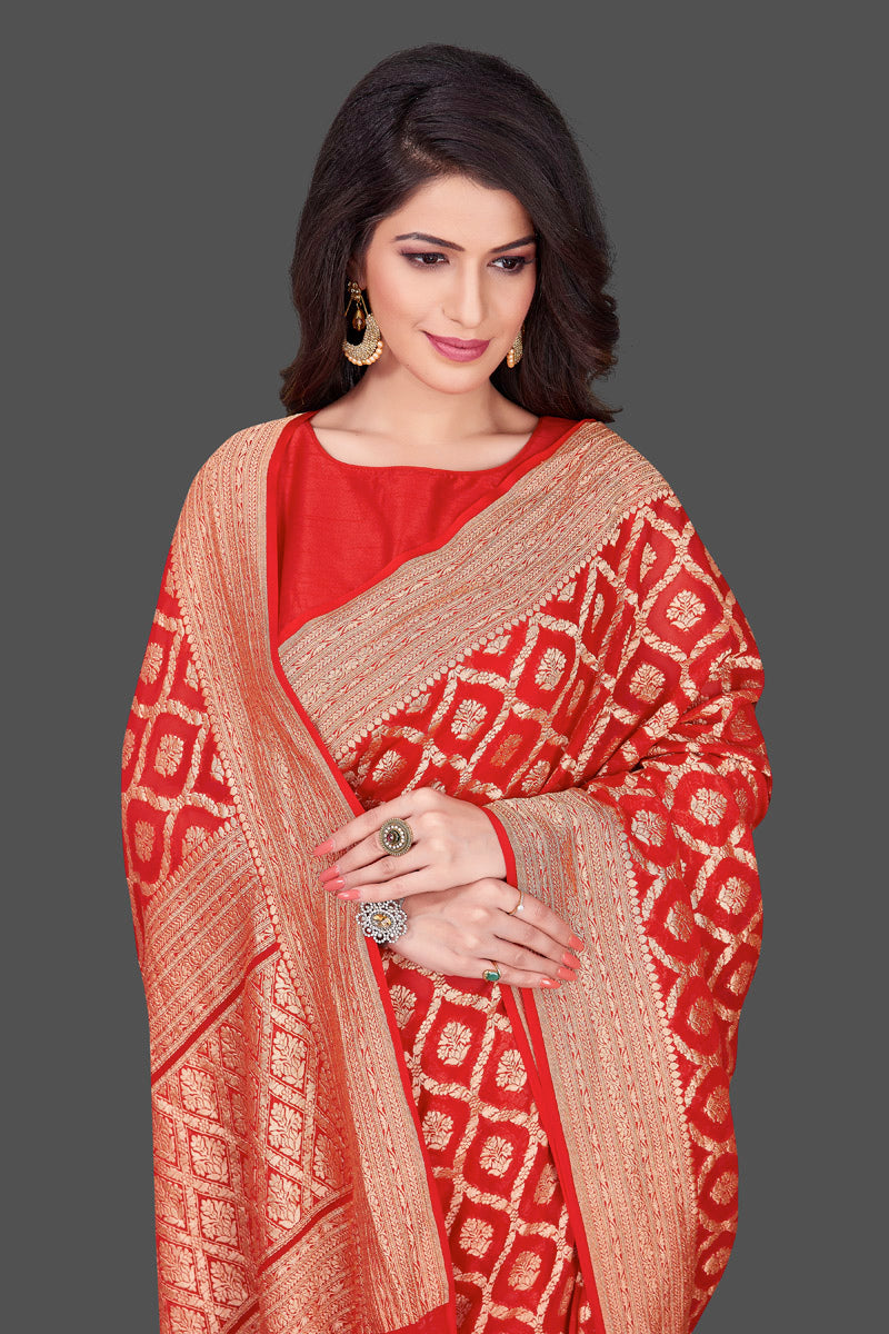 Shop purple Banarasi georgette saree online in USA with floral zari jaal. Shop beautiful Banarasi georgette sarees, tussar sarees, pure muga silk saris in USA from Pure Elegance Indian fashion boutique in USA. Get spoiled for choices with a splendid variety of Indian sarees to choose from! Shop now.-closeup