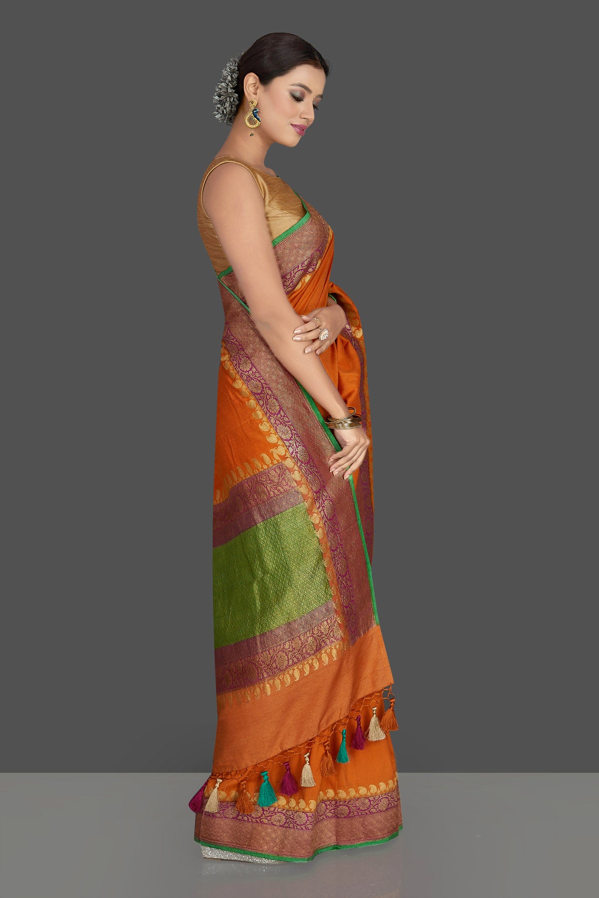 Buy beautiful mustard color muga Banarasi sari online in USA with antique zari purple border. Keep it elegant with Muga silk sarees, Banarasi silk sarees, handwoven sarees from Pure Elegance Indian fashion boutique in USA. We bring a especially curated collection of ethnic sarees for Indian women in USA under one roof!-right