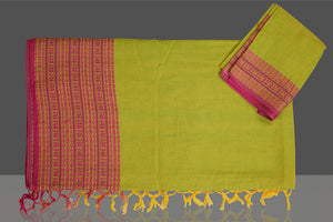 Shop beautiful pista green cotton saree online in USA with pink Assam design pallu. Flaunt Indian fashion in USA with a stunning collection of handwoven sarees, cotton sarees, pure silk sarees, designer saris in USA from Pure Elegance Indian saree store in USA.-blouse