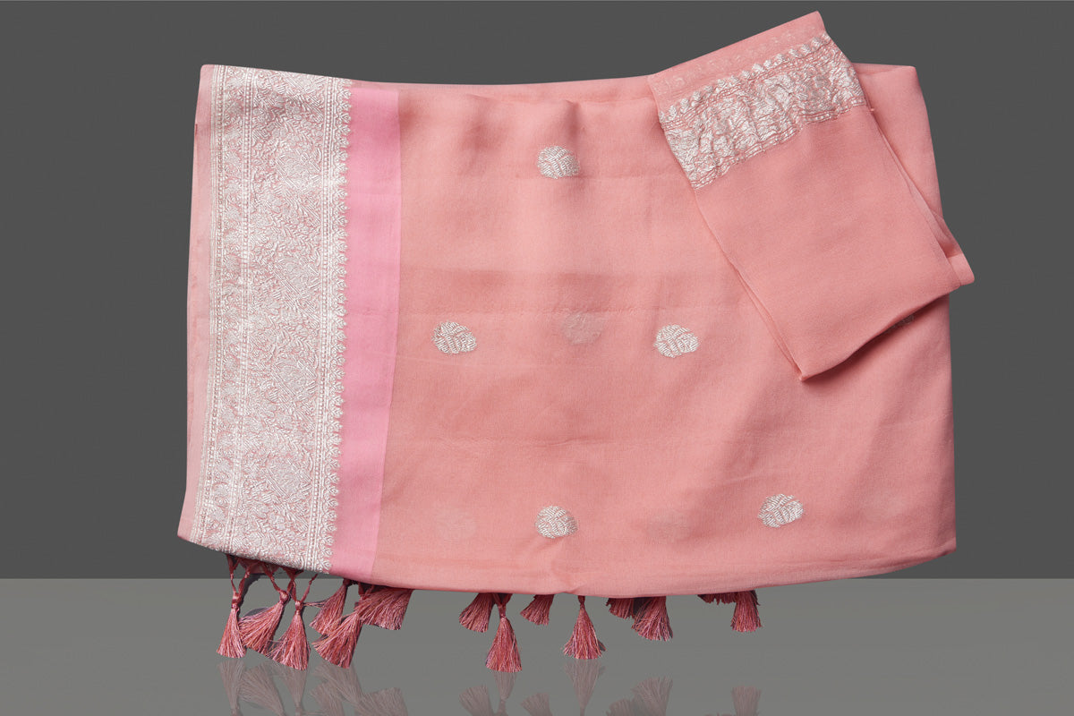 Shop gorgeous light pink chiffon georgette sari online in USA with silver zari border. Go for stunning Indian designer sarees, georgette sarees, handwoven saris, embroidered sarees for festive occasions and weddings from Pure Elegance Indian clothing store in USA.-blouse