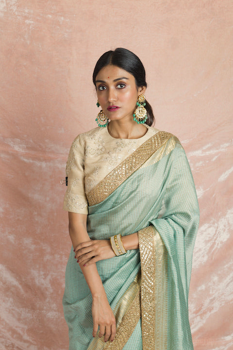 Buy gorgeous mint green embroidered handloom saree online in USA with cream embroidered saree blouse. Champion ethnic fashion on weddings and festivals with a stunning collection of designer sarees, handloom sarees with blouse, wedding sarees, from Pure Elegance Indian fashion store in USA.-closeup