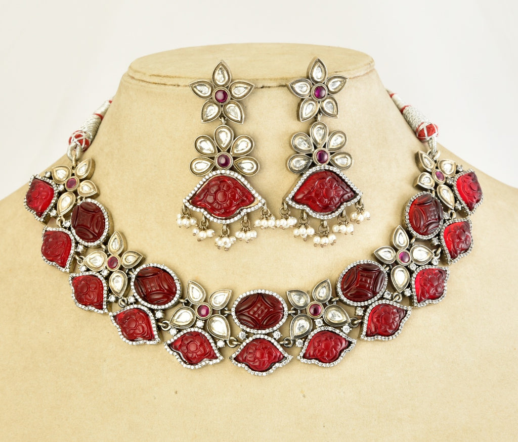 Shop Amrapali red stone and kundan necklace set online in USA with earrings. Buy beautiful gold plated jewelry, gold plated earrings, silver earrings, silver bangles, bridal jewelry, wedding jewellery from Pure Elegance Indian fashion store in USA.-full view
