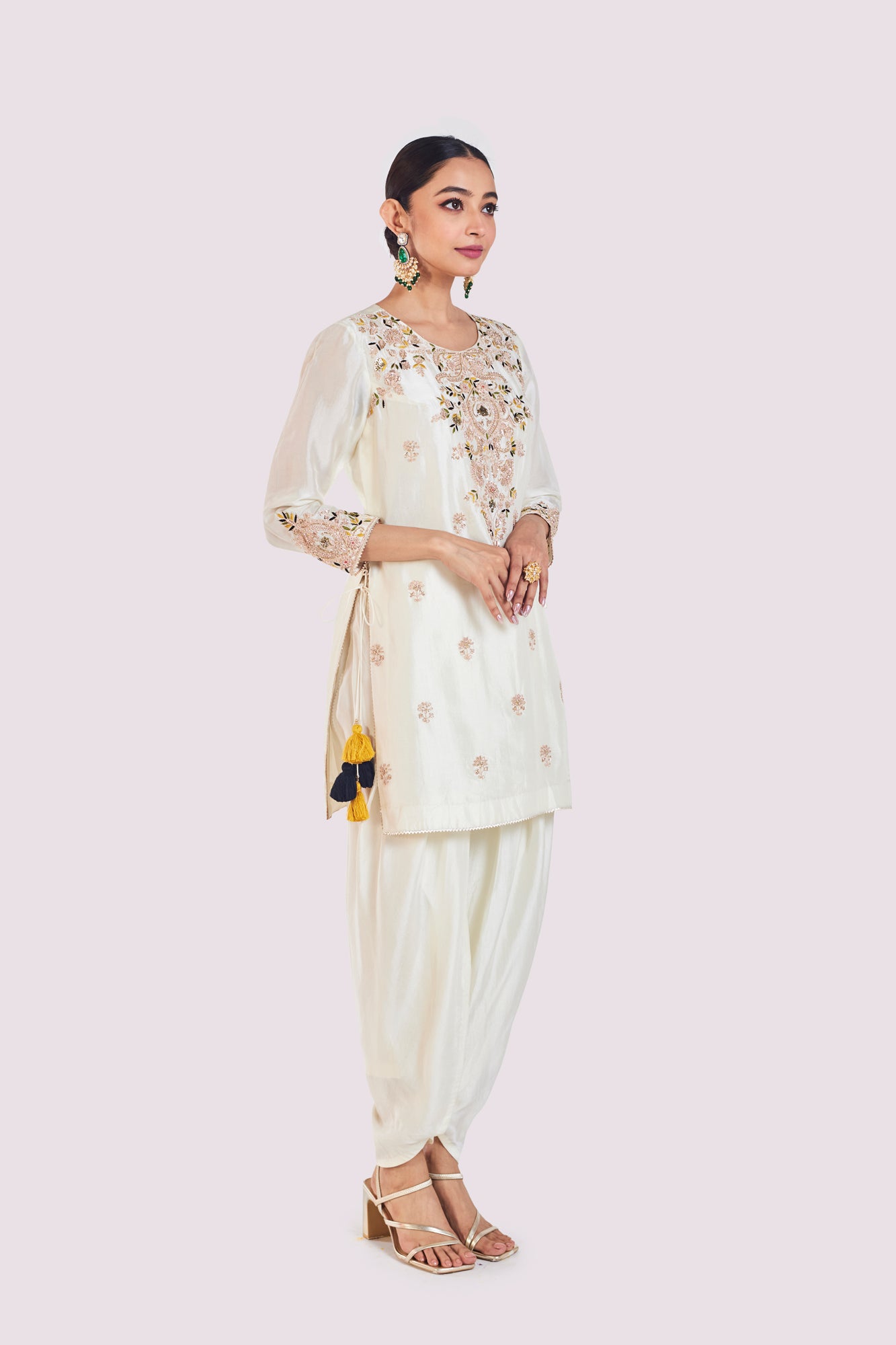 Shop stunning off-white resham work silk dhoti suit online in USA. Shop the best and latest designs in embroidered sarees, designer sarees, Anarkali suit, lehengas, sharara suits for weddings and special occasions from Pure Elegance Indian fashion store in USA.-side
