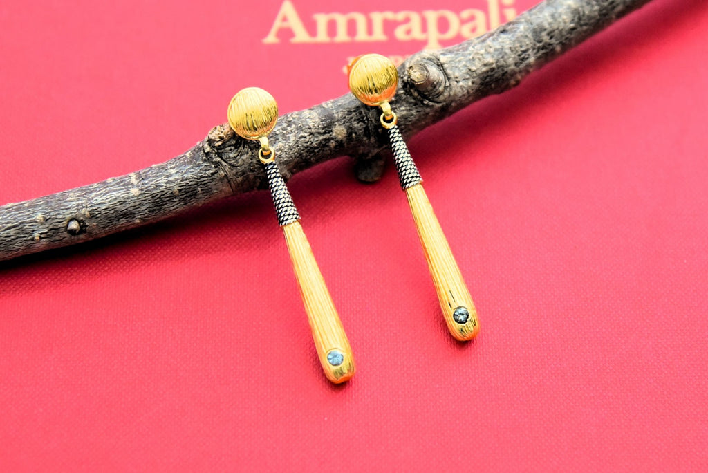 Buy stunning gold plated sleek drop earrings online in USA. Elevate your traditional look with royal Amrapali jewelry, silver plated jewelry, gold plated jewelry, gold plated necklace, silver earrings, silver bangles from Pure Elegance Indian fashion store in USA.-front