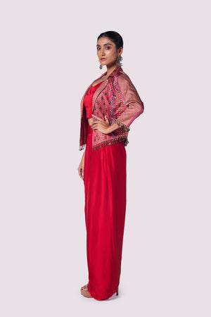 Buy red satin draped skirt with blouse online in USA and embroidered jacket. Shop the best and latest designs in embroidered sarees, designer sarees, Anarkali suit, lehengas, sharara suits for weddings and special occasions from Pure Elegance Indian fashion store in USA.-side