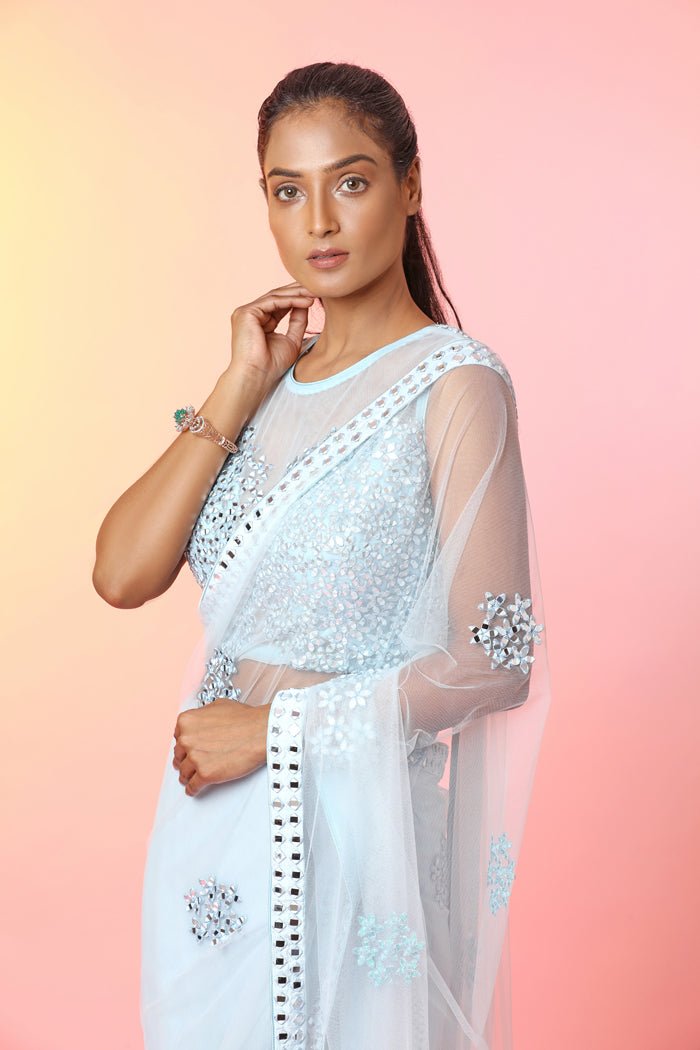 Buy stunning powder blue mirror work saree online in USA with designer blouse. Look your best at weddings and parties in Indian dresses, designer lehengas, Anarkali suits, designer gowns, salwar suits, sharara suits, embroidered sarees, designer sarees from Pure Elegance Indian fashion store in USA.-closeup