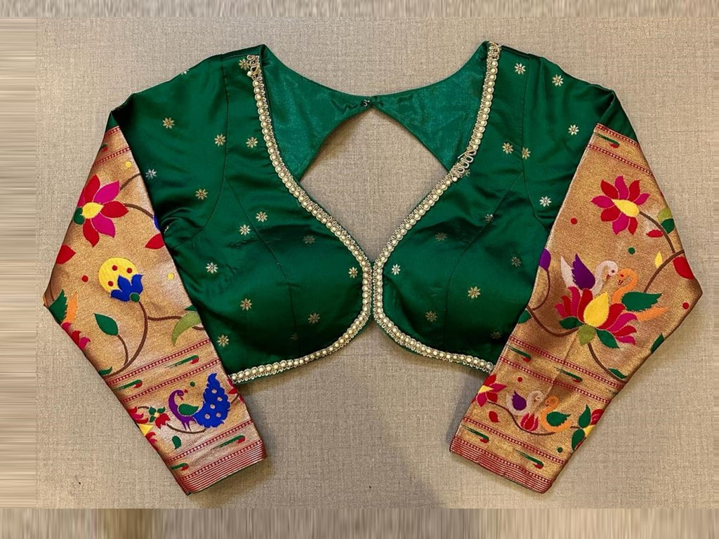 Buy bottle green and golden Paithani saree blouse online in USA. Elevate your saree style with exquisite readymade sari blouses, embroidered saree blouses, Banarasi sari blouse, designer saree blouse, choli-cut blouses, corset blouses from Pure Elegance Indian fashion store in USA.-full view