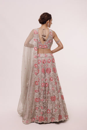 Shop this grey lehenga with a sleeveless blouse it comes with A-line bottom and blouse. Dazzle on weddings and special occasions with exquisite Indian designer dresses, sharara suits, Anarkali suits, bridal lehengas, and sharara suits from Pure Elegance Indian clothing store in the USA. Shop online from Pure Elegance.