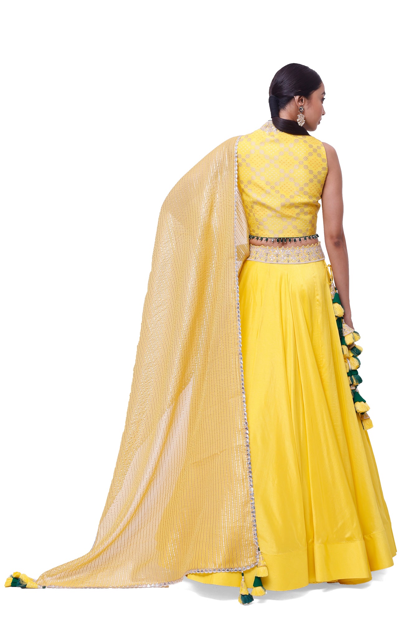Buy beautiful yellow tussar silk embroidered lehenga online in USA with organza dupatta. Dazzle on weddings and special occasions with exquisite designer lehengas, Anarkali suit, sharara suit, Indowestern outfits, bridal lehengas from Pure Elegance Indian clothing store in the USA. -back