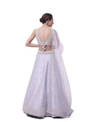 Shop silver tissue embroidered lehenga online in USA with upatta. Dazzle on weddings and special occasions with exquisite designer lehengas, Anarkali suit, sharara suit, Indowestern outfits, bridal lehengas from Pure Elegance Indian clothing store in the USA. -back