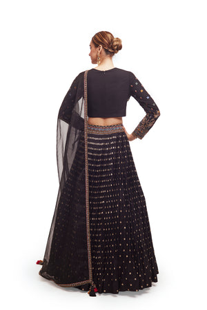 Shop beautiful black raw silk lehenga online in USA with multicolor embroidery. Dazzle on weddings and special occasions with exquisite designer lehengas, Anarkali suit, sharara suit, Indowestern outfits, bridal lehengas from Pure Elegance Indian clothing store in the USA. -back