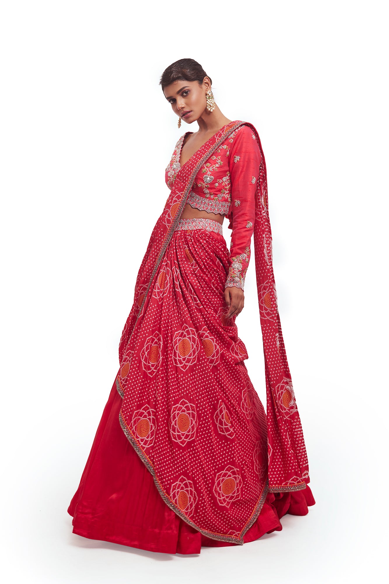 Buy beautiful rani pink embroidered Bandhej silk lehenga online in USA with dupatta. Dazzle on weddings and special occasions with exquisite designer lehengas, Anarkali suit, sharara suit, Indowestern outfits, bridal lehengas from Pure Elegance Indian clothing store in the USA. -lehenga