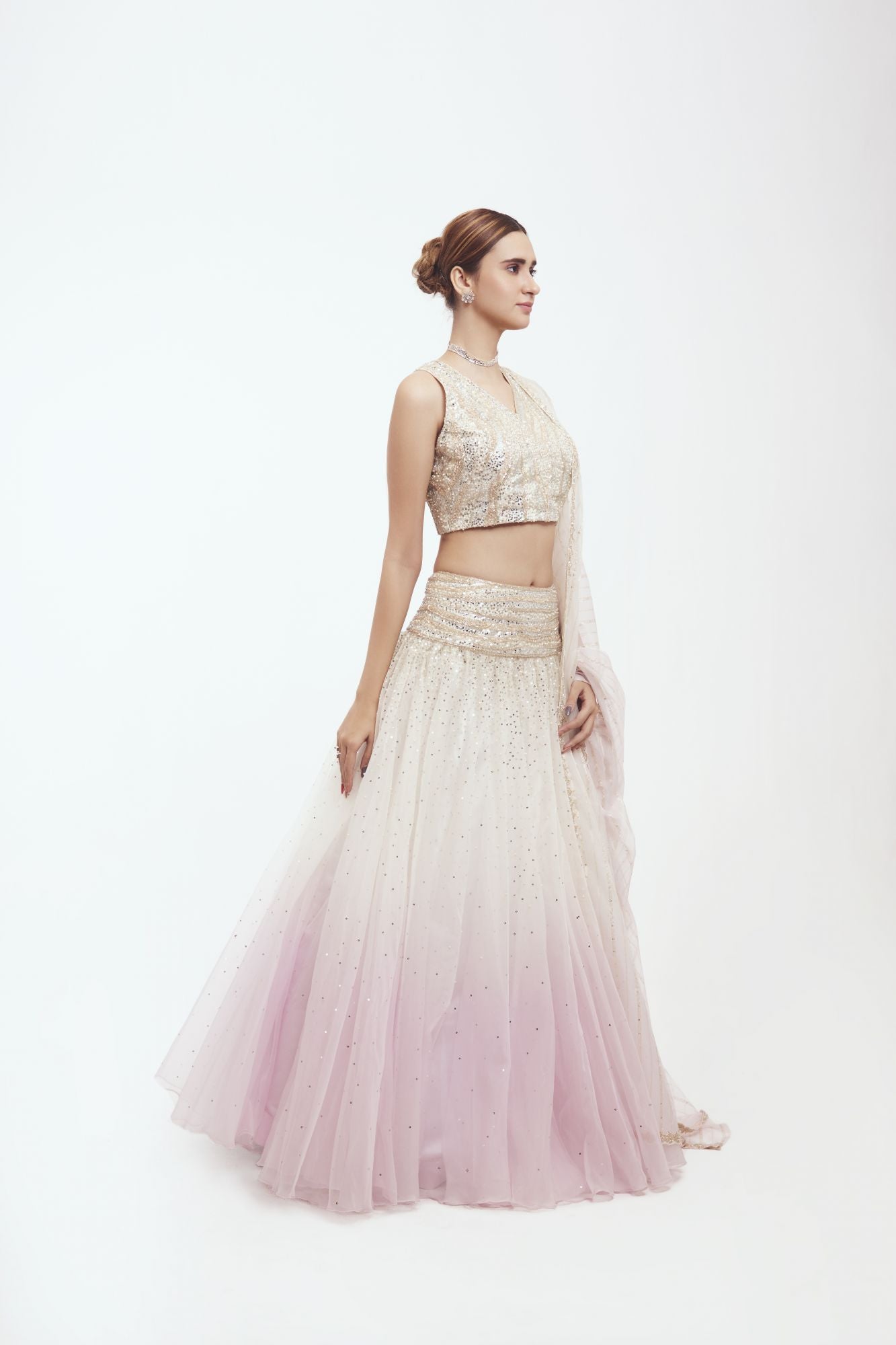 Buy dual tone embroidered organza lehenga online in USA with dupatta. Dazzle on weddings and special occasions with exquisite designer lehengas, Anarkali suit, sharara suit, Indowestern outfits, bridal lehengas from Pure Elegance Indian clothing store in the USA. -side