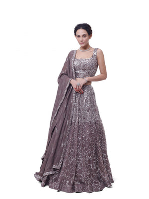 Buy grey sequin and mirror work lehenga online in USA with dupatta. Dazzle on weddings and special occasions with exquisite designer lehengas, Anarkali suit, sharara suit, Indowestern outfits, bridal lehengas from Pure Elegance Indian clothing store in the USA. -front