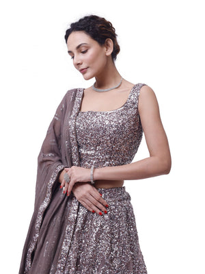 Buy grey sequin and mirror work lehenga online in USA with dupatta. Dazzle on weddings and special occasions with exquisite designer lehengas, Anarkali suit, sharara suit, Indowestern outfits, bridal lehengas from Pure Elegance Indian clothing store in the USA. -closeup