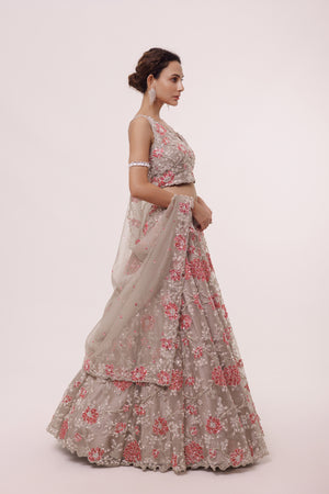 Buy greige embroidered organza lehenga online in USA with dupatta. Dazzle on weddings and special occasions with exquisite designer lehengas, Anarkali suit, sharara suit, Indowestern outfits, bridal lehengas from Pure Elegance Indian clothing store in the USA. -side
