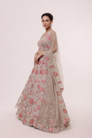 Buy greige embroidered organza lehenga online in USA with dupatta. Dazzle on weddings and special occasions with exquisite designer lehengas, Anarkali suit, sharara suit, Indowestern outfits, bridal lehengas from Pure Elegance Indian clothing store in the USA. -lehenga