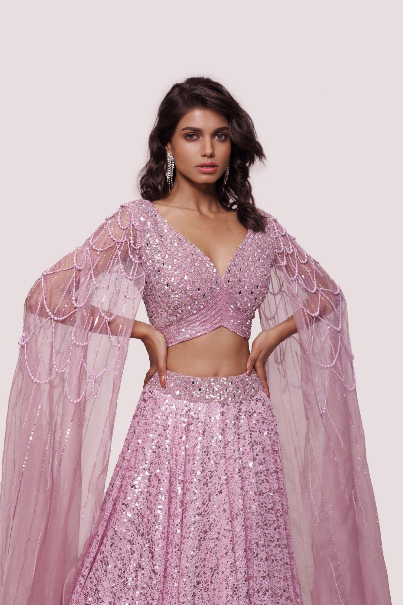 Shop lilac embroidered net and organza lehenga online in USA. Dazzle on weddings and special occasions with exquisite designer lehengas, Anarkali suit, sharara suit, Indowestern outfits, bridal lehengas from Pure Elegance Indian clothing store in the USA. -closeup